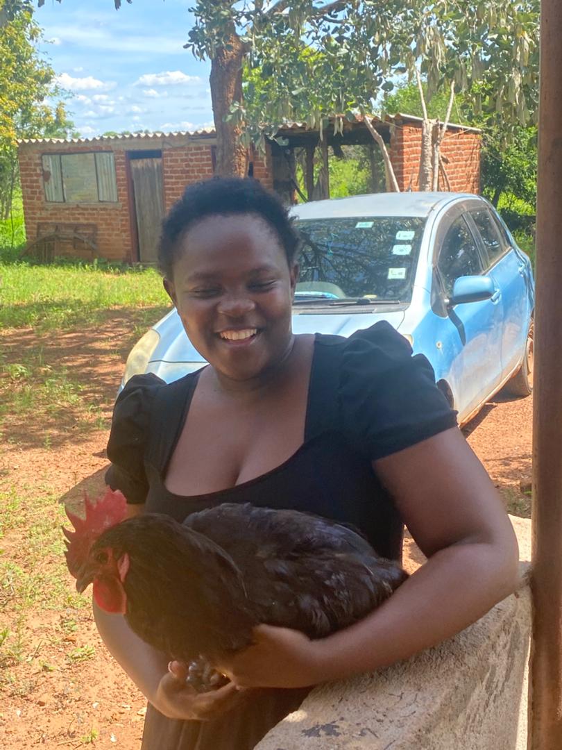 Farmer with chicken